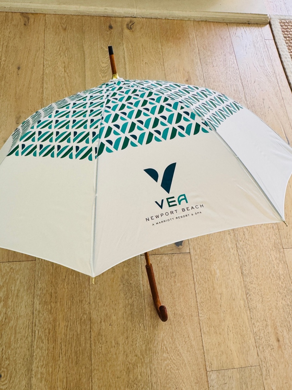 Marriott Vea Newport Beach Hotel White and Teal Logo Umbrella